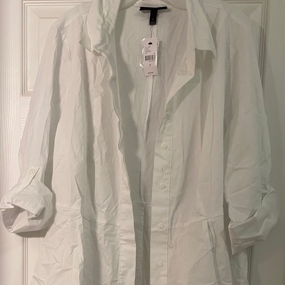 Long sleeve button up peplum style Hi Low shirt
